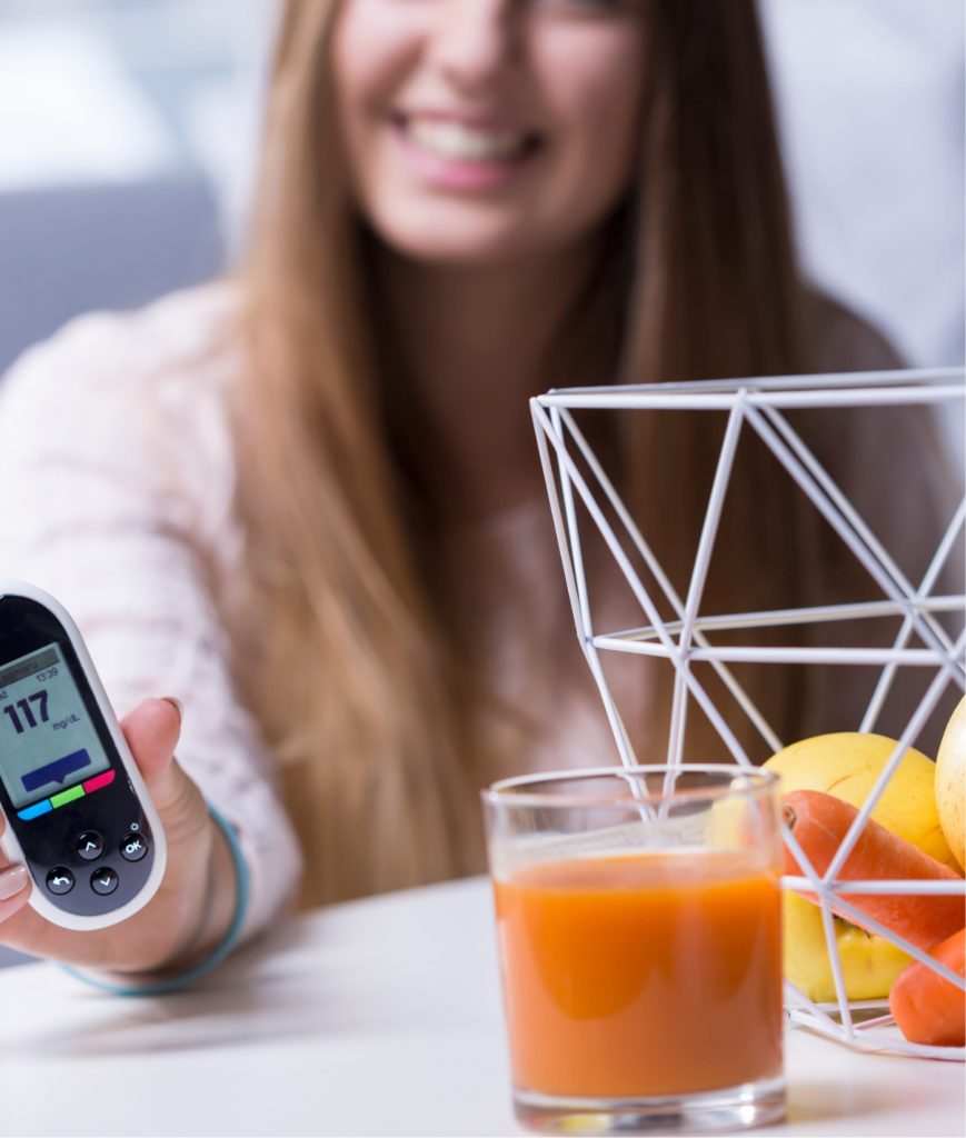 Woman checking her blood sugar levels